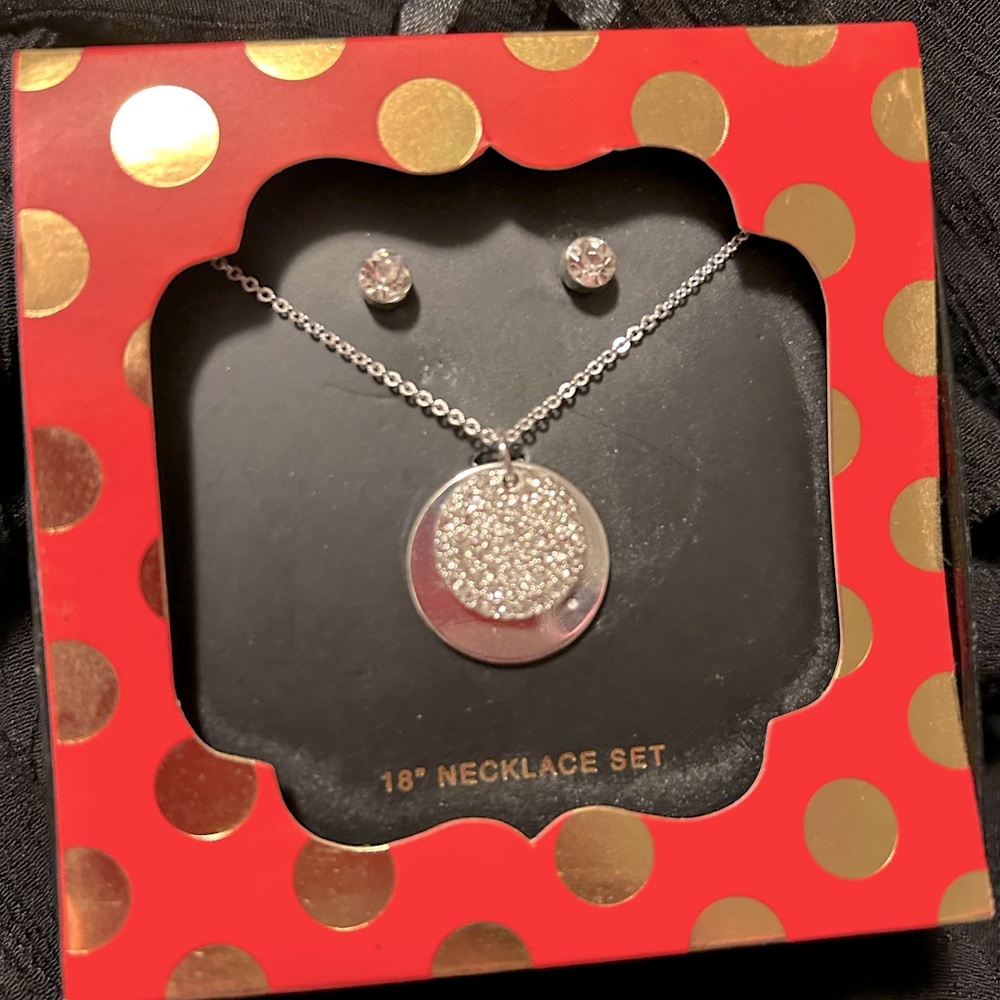 Faux silver jewelry set.